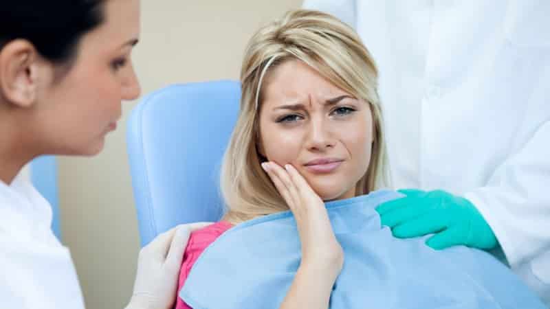 , почему ноет болит зуб мудрости что делать