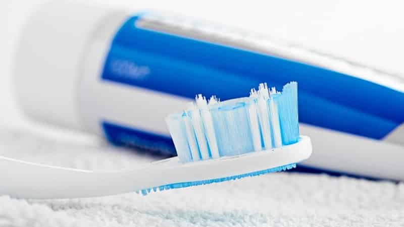 от чего появляется зубной камень причины